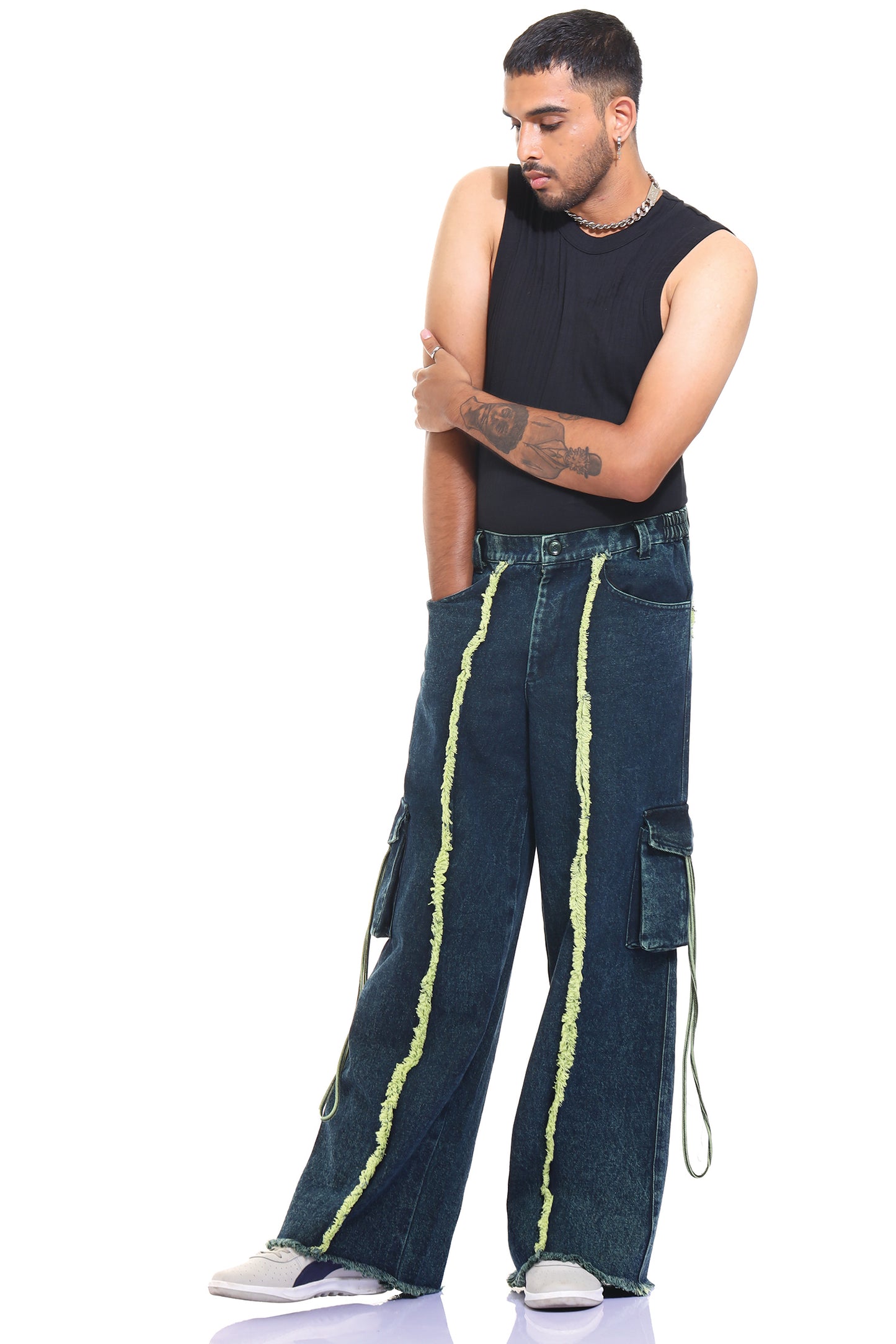 Oversized jeans | Streetwear jeans | outwear jeans | relaxed fit jeans | unisex apparel | indian streetwear | baggy jeans | baggy jeans | kokobongo jeans | green oversized jeans | acid washed jeans | stone wash | hand dyed | frayed jeans | rugged jeans | green jeans | sleeveless jeans | sleeveless streetwear | sleeveless streetwear jeans | utility jeans | raw edges cargos | cargos with pocket | green jeans | blue jeans | green and blue jeans | trendy jeans | jeans with pocket